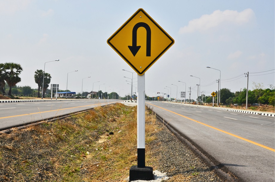 u turn street sign