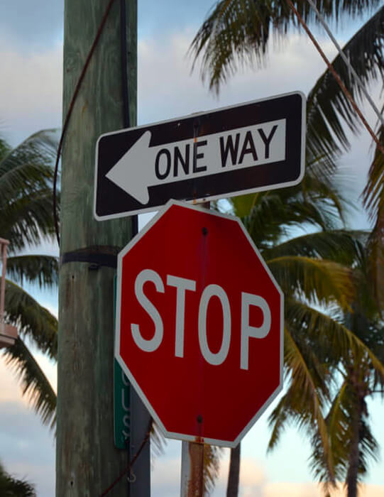 worn road sign which means it is forbidden to go here Stock Photo