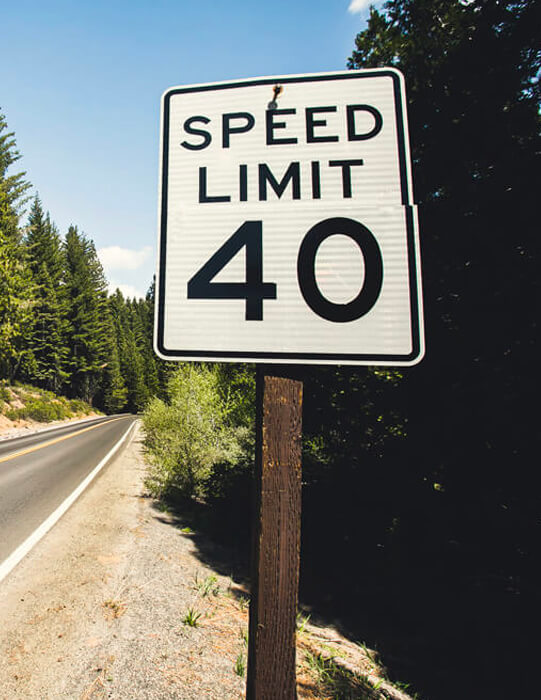 Mean speed. Speed limit sign. Speed limit on the Road. Slow down Traffic sign. 10 Mph sign on Road.